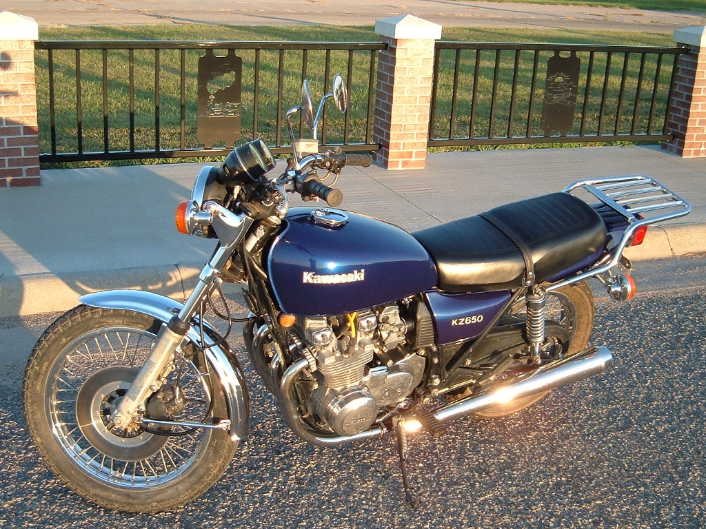 Left side view of a Kz650 motorcycle in Laser Blue Metallic livery at the Marysville, KS airport.