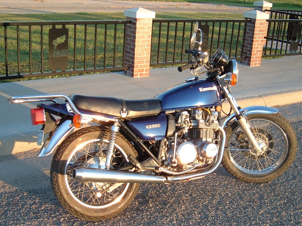 Right side view of a Kz650 motorcycle in Laser Blue Metallic livery at the Marysville, KS airport.
